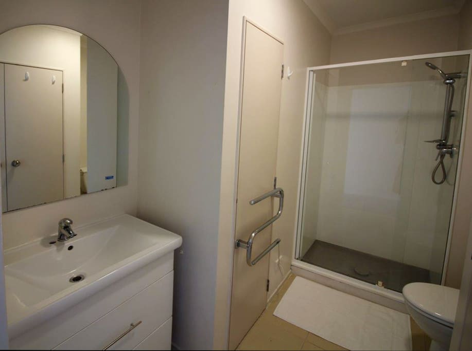 Full bathroom & laundry
