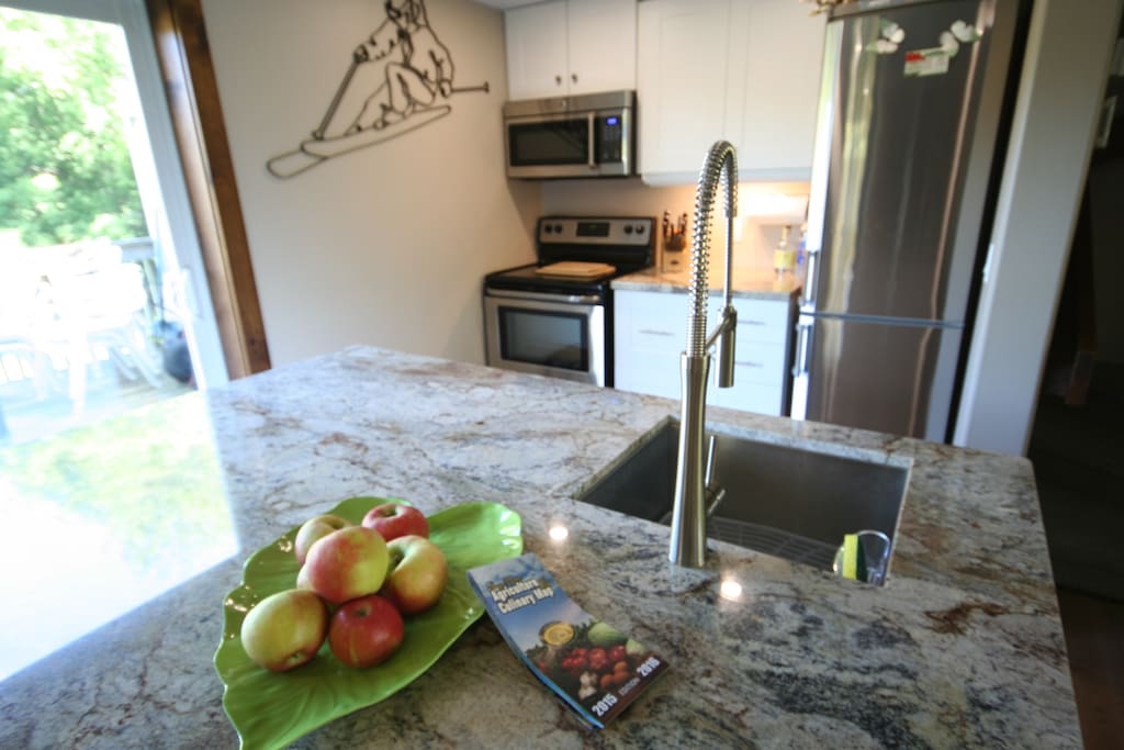 Granite Counter-top! Funky Faucet and Convection microwave Oven
