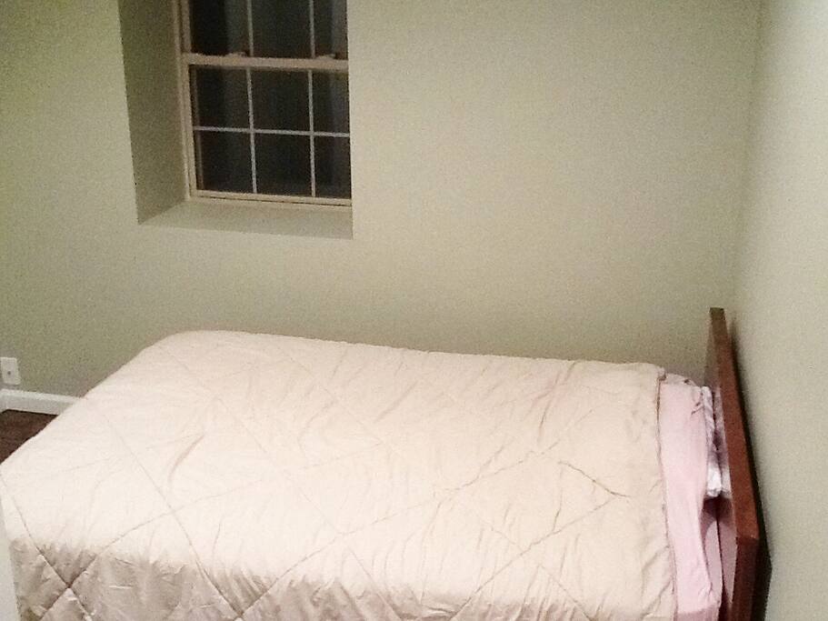 Private bedroom with locking door and closet.
