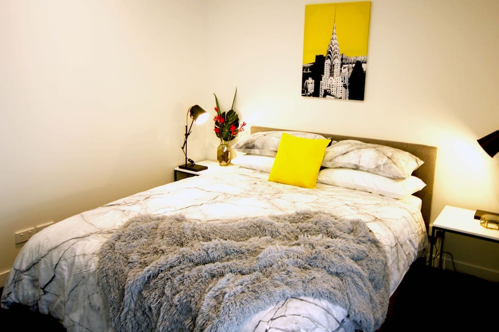 Luxuriously appointed main bedroom with Queen sized bed.