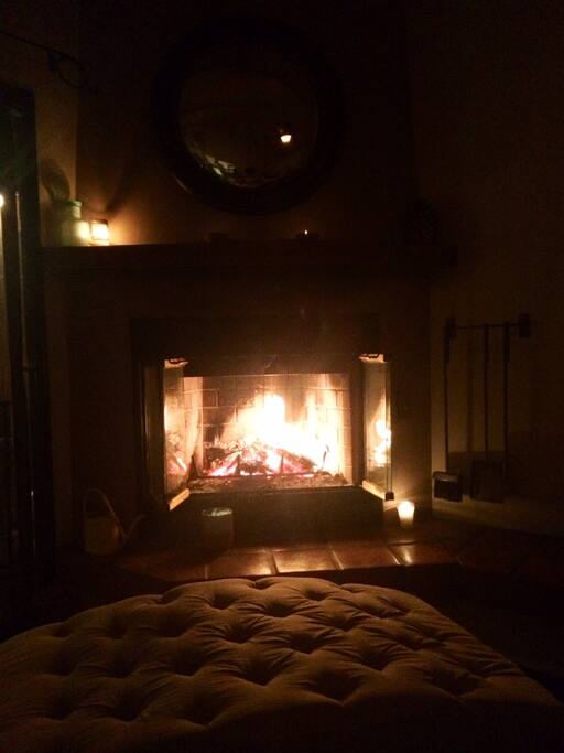 Natural wood fireplace really heats up the family room and makes for cozy evenings.