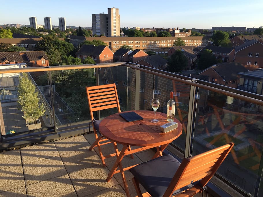 Sun terrace with views of Bermondsey and the Shard.