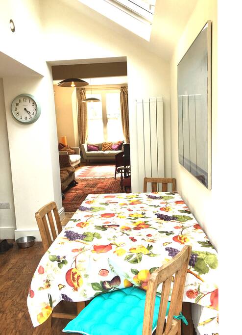 Kitchen table leading to living room