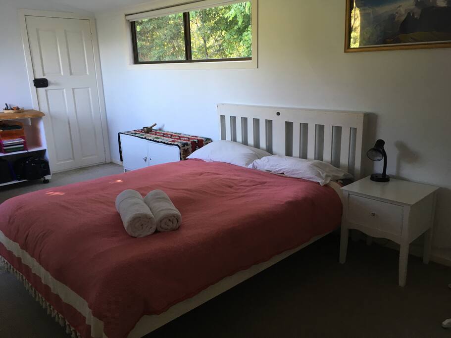 Bedroom with queen bed, nature views and private verandah