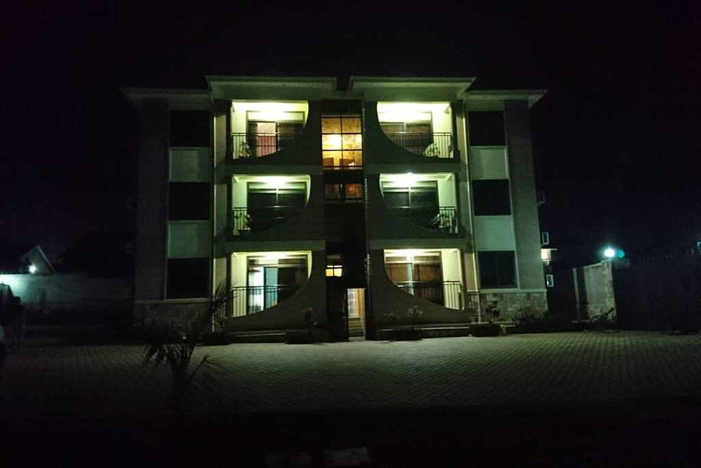 The facade at night as seen from the garden