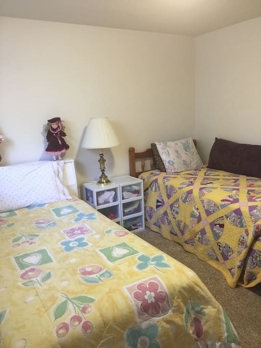 Second private bedroom with one double bed and one single bed