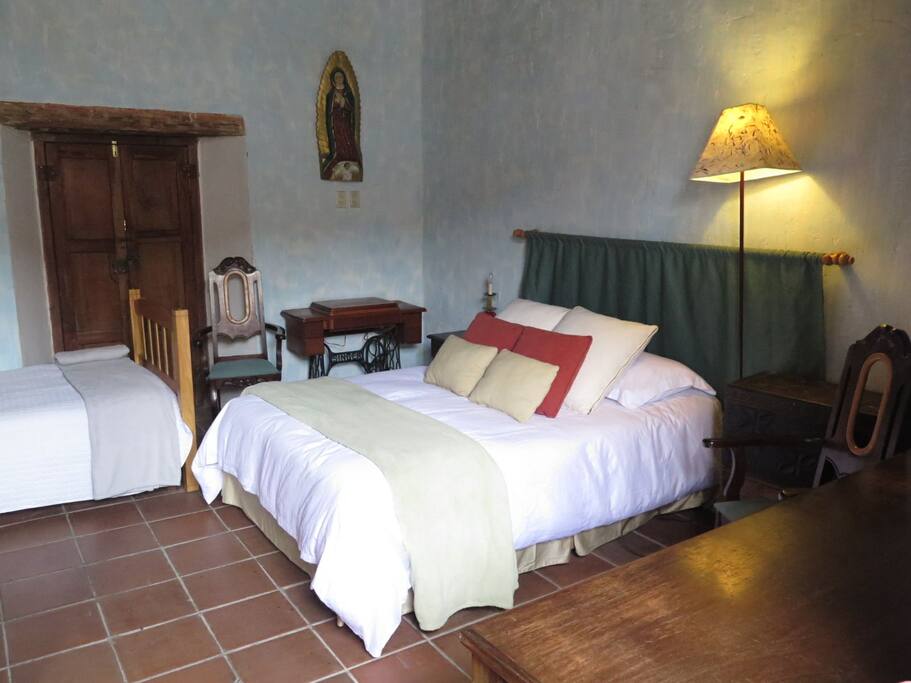 Bedroom 1 downstairs. One full bed and one twin bed.