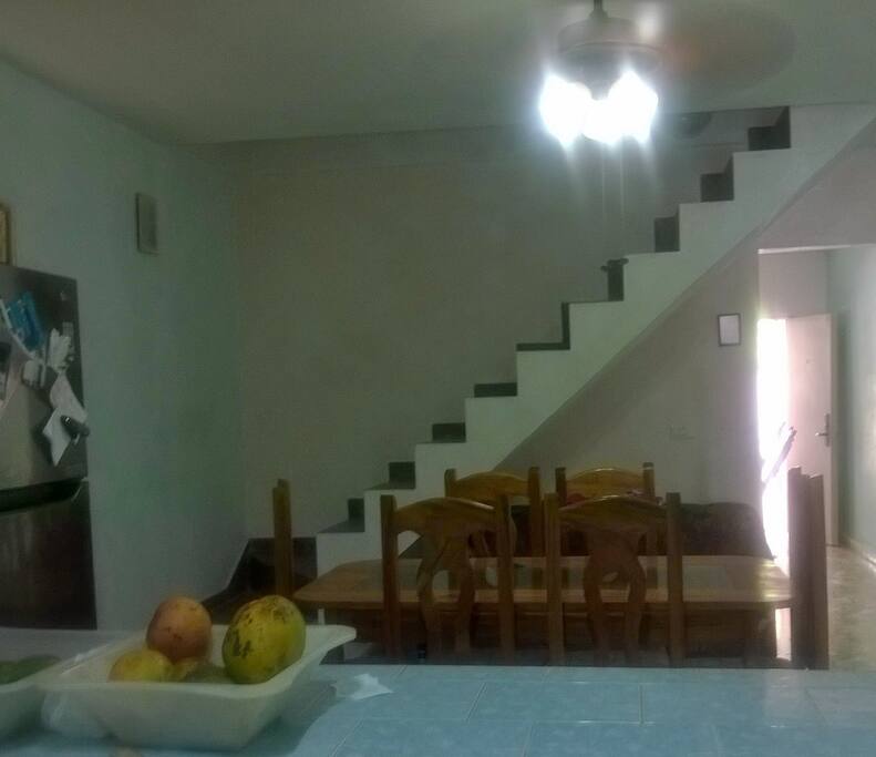 Dinning room with stairs to bedrooms