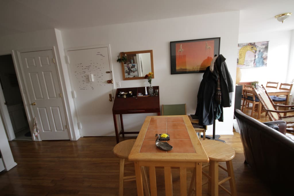 Entrance with washer and dryer unit to the left