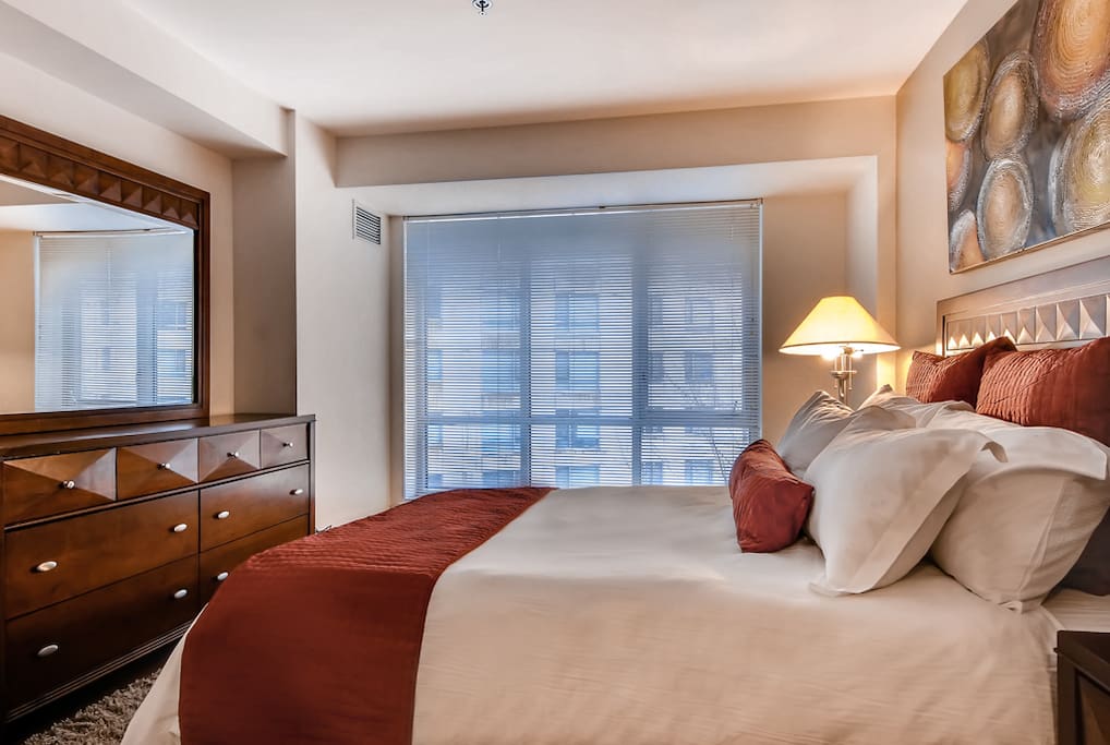 Spacious second bedroom with queen size bed and large closet