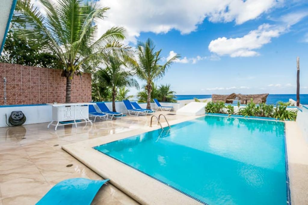 Large pool with comfortable loungers