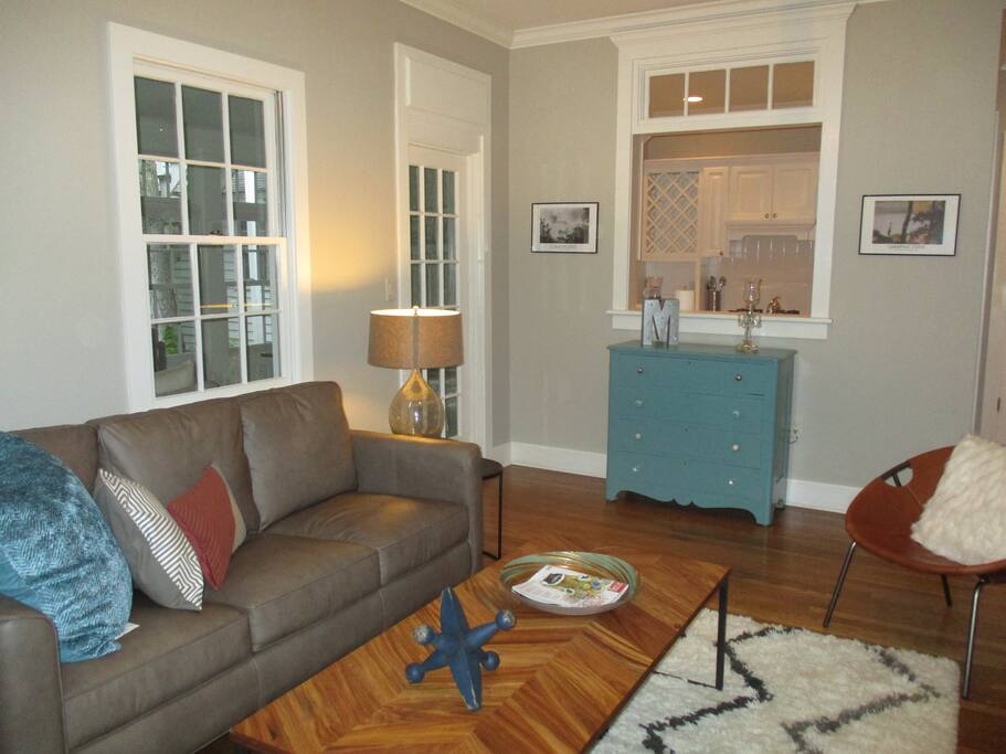 Living space opens to kitchen area and has access to front porch area