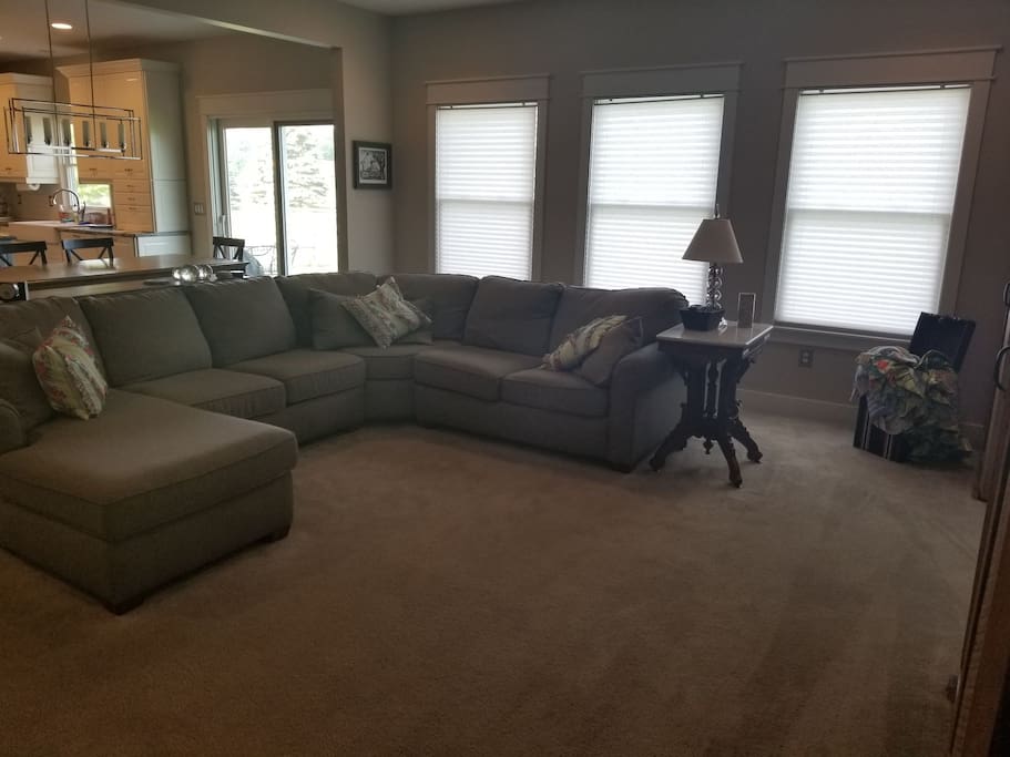 Family room with kitchen in background.