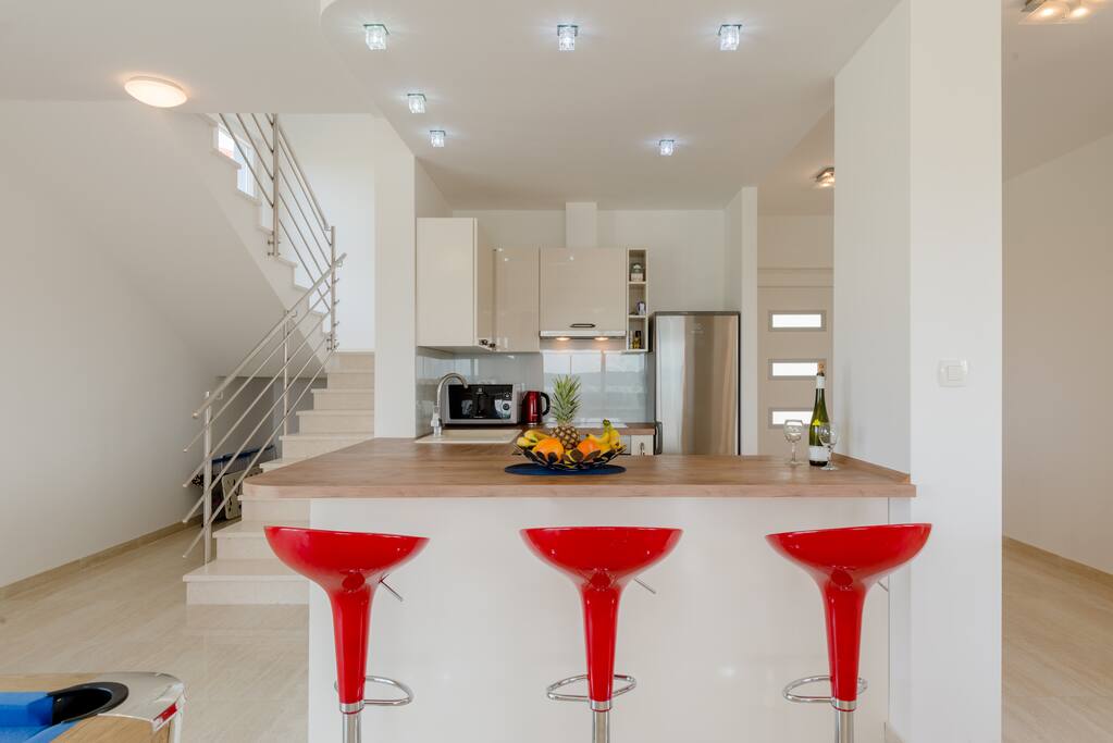 Fully equipped kitchen includes dishwasher, fridge + freezer, microwave, oven and kettle