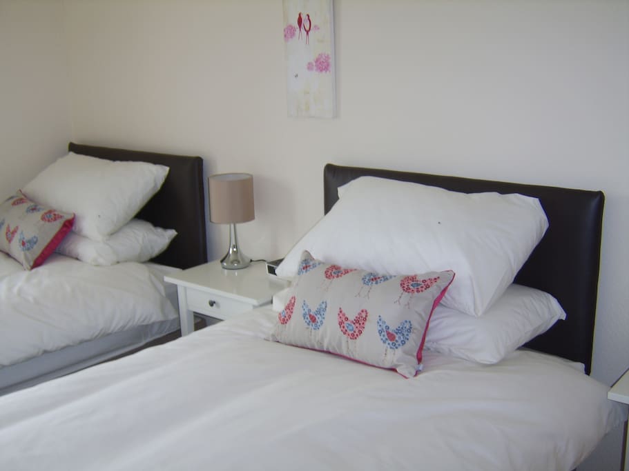 back bedroom can have either a super kingsize or two single beds