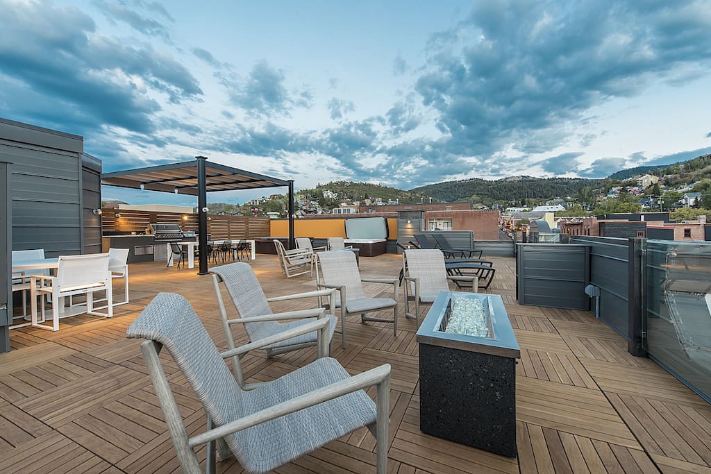 Enjoy the Rooftop Deck with Outdoor Kitchen, Hot Tub, Fire Pit, and Sitting Area