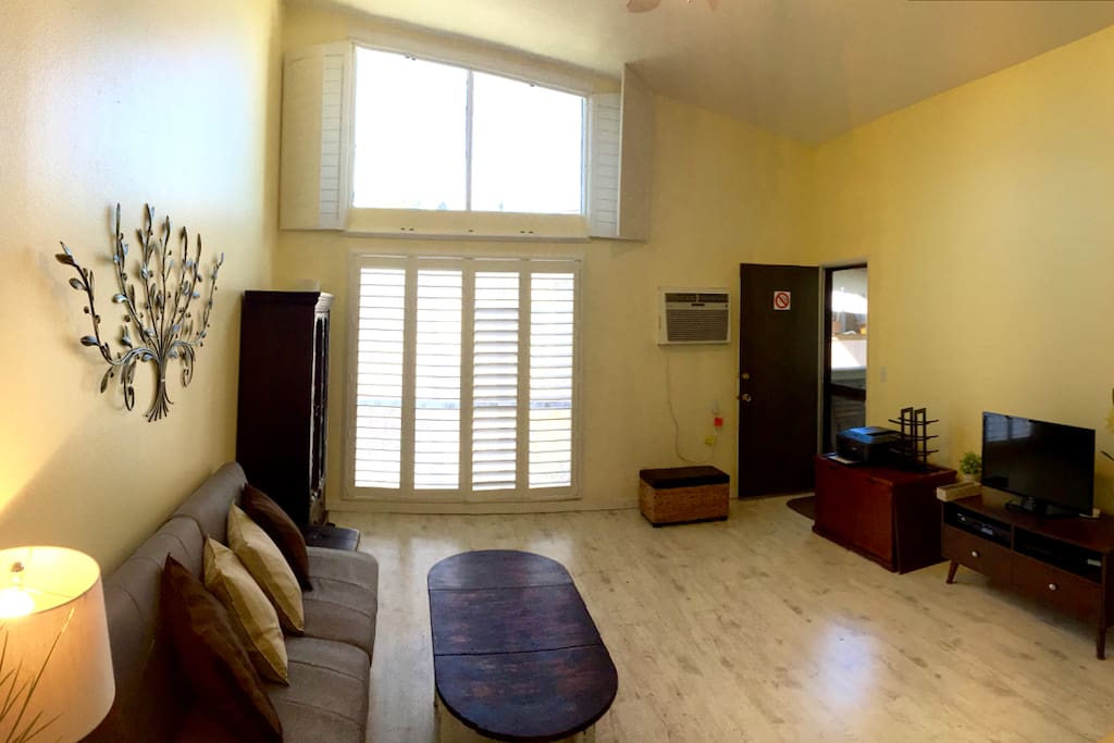 Living Room - windows are treated for blocking 99% UV and heat from sunlight.