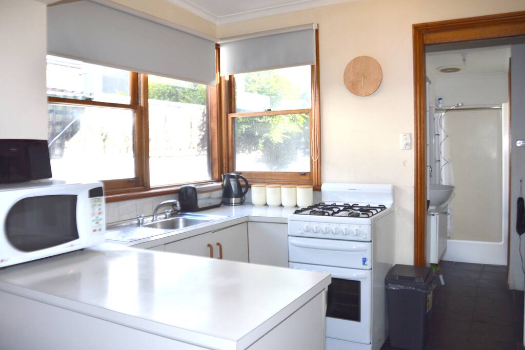Stereo and all kitchen essentials with dishwasher. Attaching bathroom & laundry