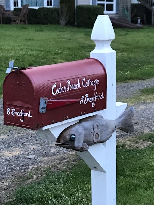 Look for the red mailbox on your right