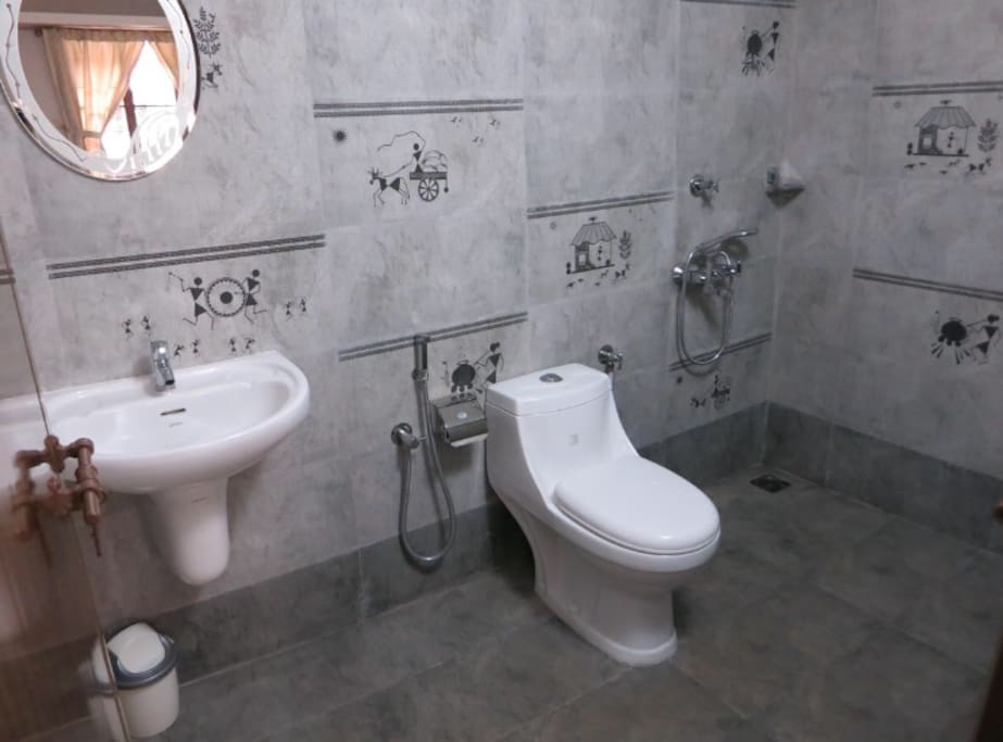 Spacious bathroom with hot water powered by solar panels