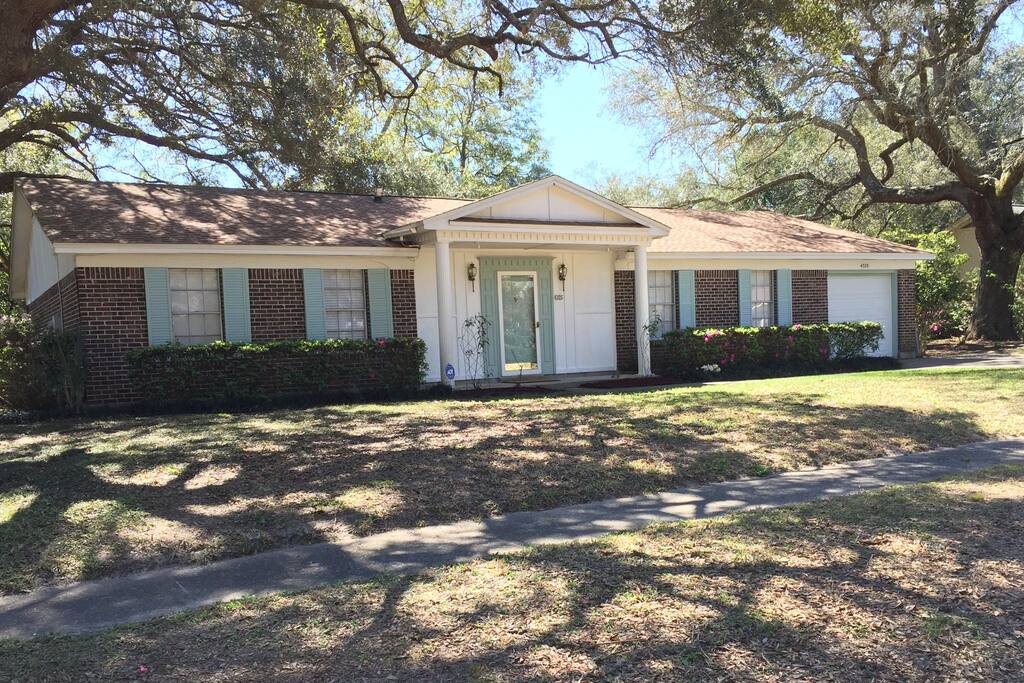 Mature oaks provide shade and majesty to the property.