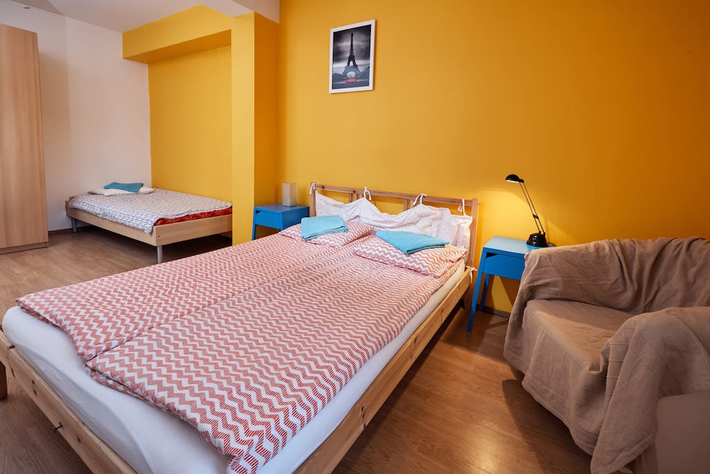 Bedroom. Bed for two people, in the corner of the bed for one person, armchair, wardrobe, bedside cabinets