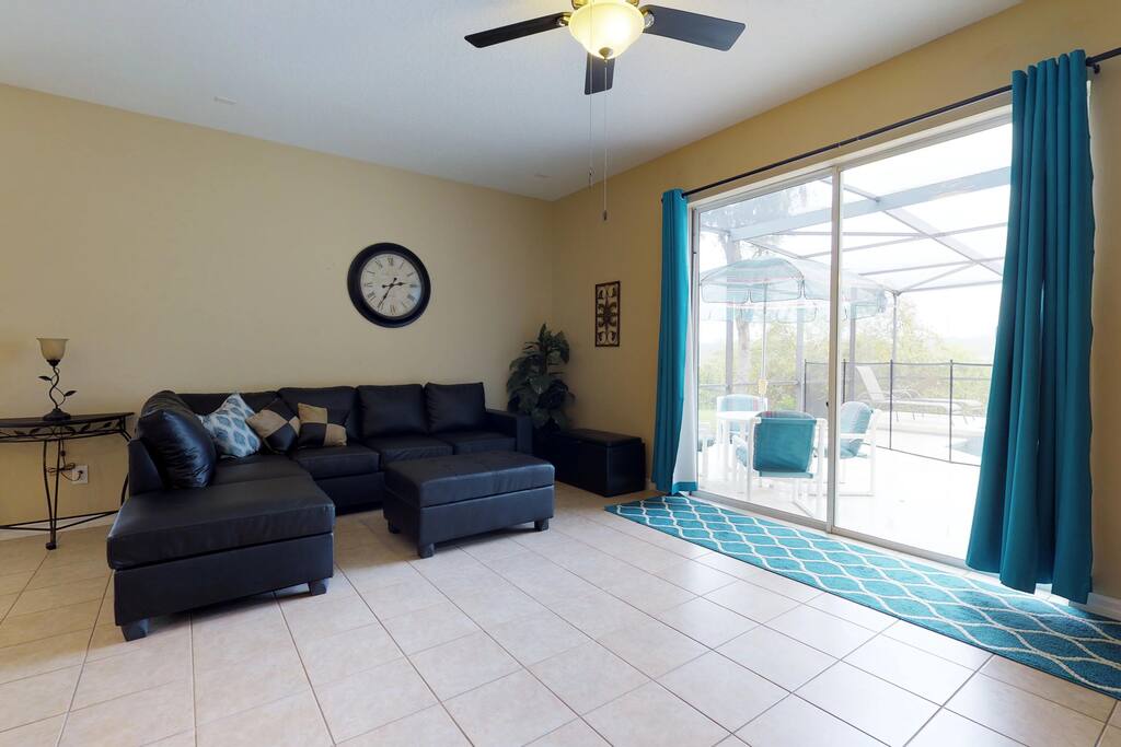 Bright open family space overlooking large patio area