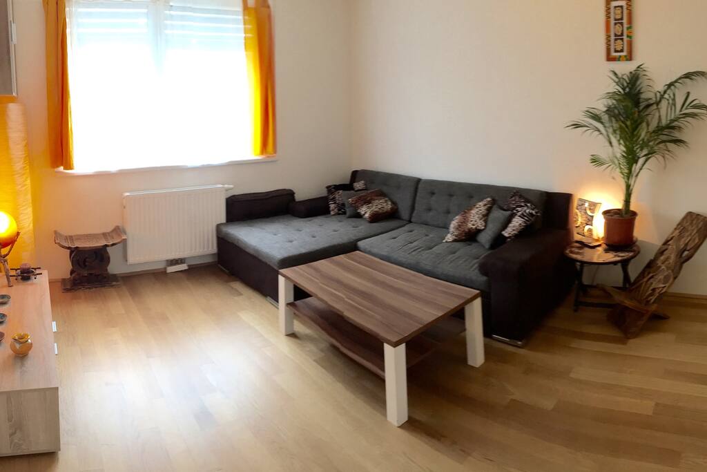 Living room with extendable couch. Extends to a double bed size 140x200cm
