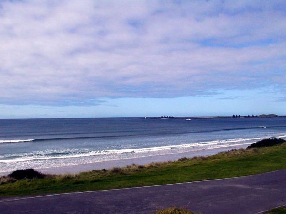 View from front balcony, rolling waves and lighthouse