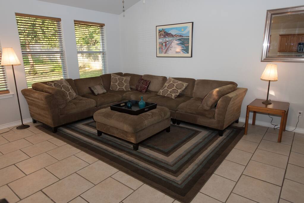 Living area opens to dining and kitchen