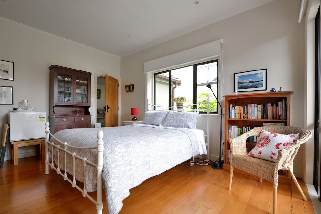 Small fridge in bedroom