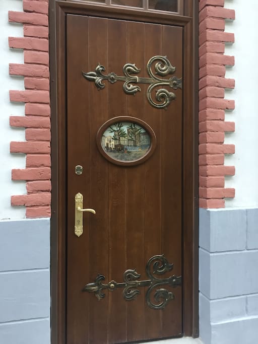 The entrance door with authentic decor