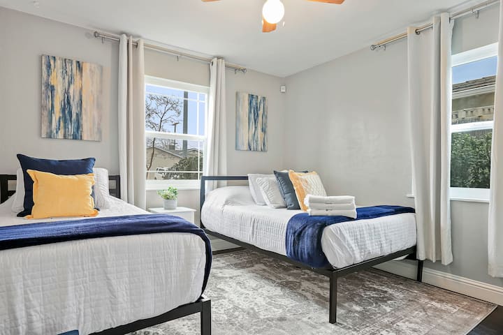 Bedroom #2: Twin bed, Full bed and TV.