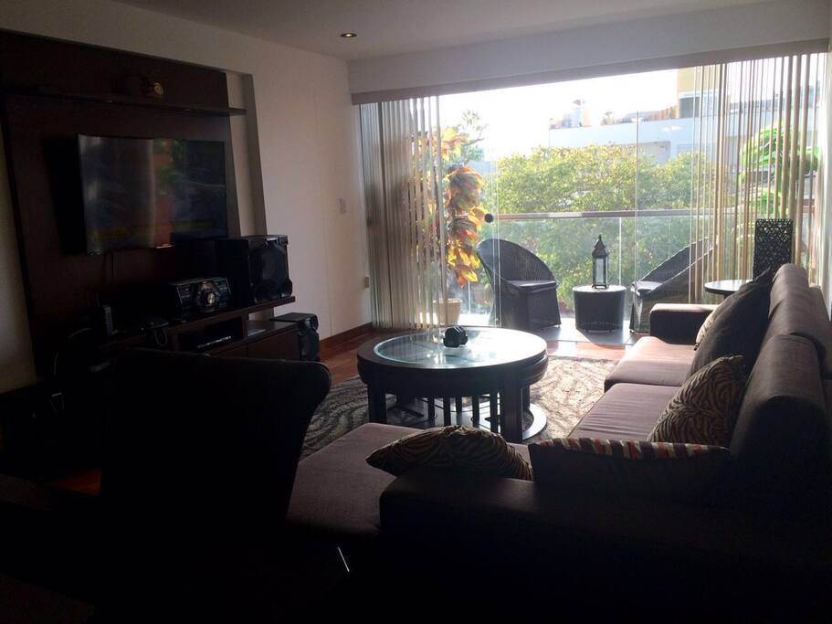 Comfortable lounge with adjacent balcony