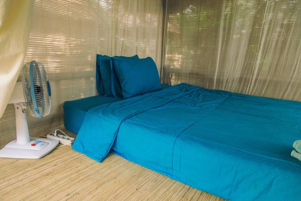Double bed with a fan