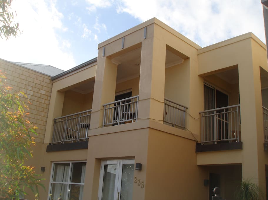 You have two balconies from your room with a small table and chairs