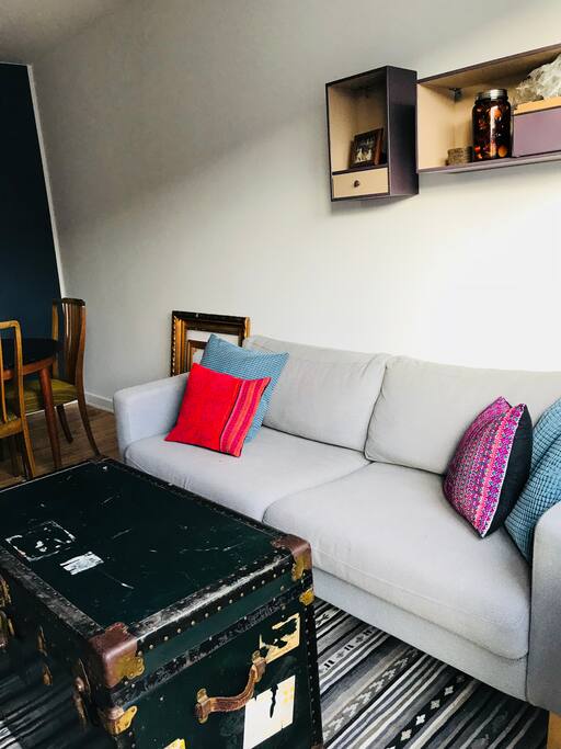 Sofa. Take the back pillows out and you have a single bed!