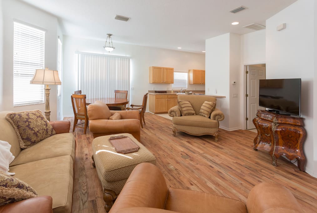 Great room, 10 ft ceilings, new wood floor with eco orange finish