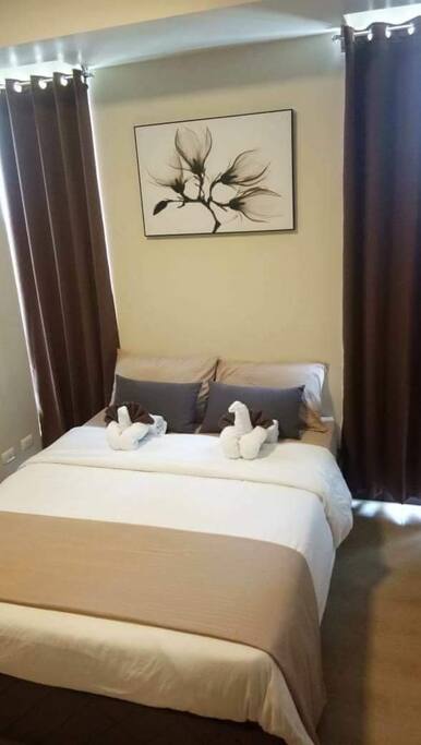 Queen size bed with a pull out bed under.