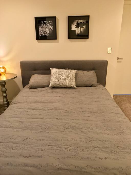 Queen bed in bedroom sleeps 2