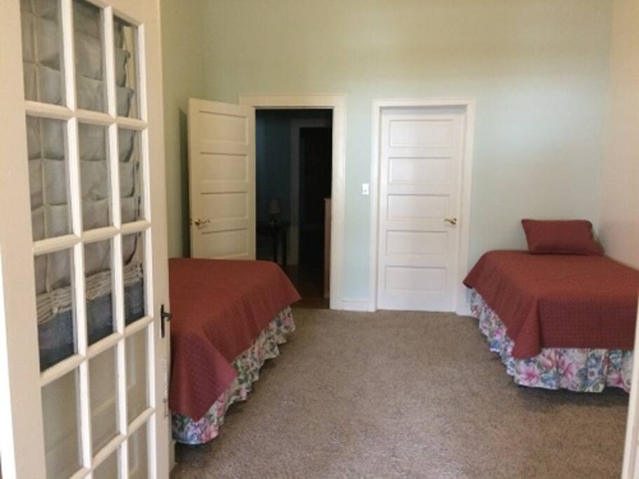 Two twin beds adjoining East Bedroom
