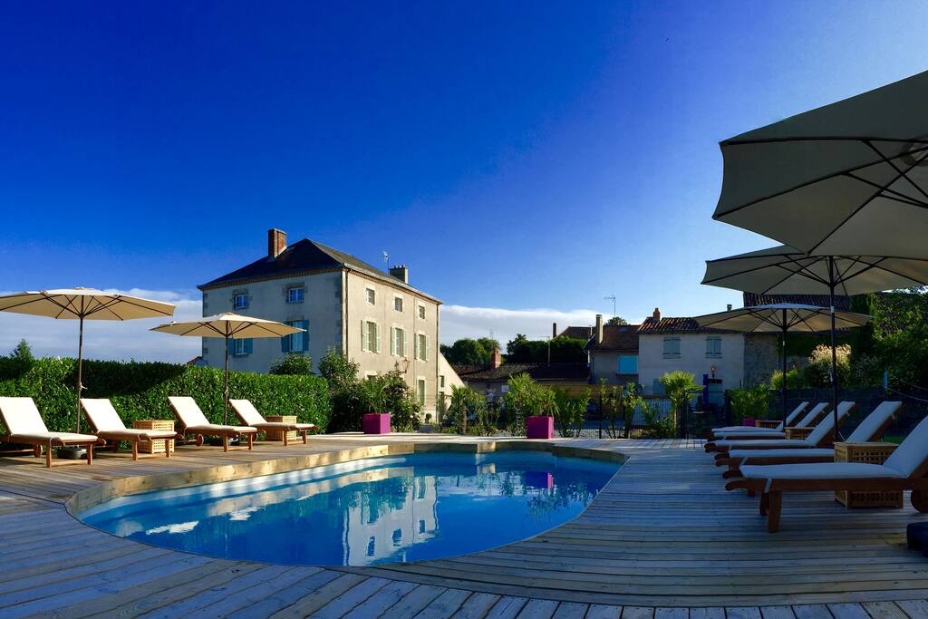 pool area over looking main house and gite.