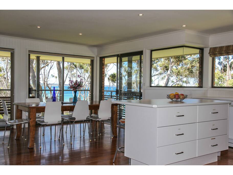 Modern & open living area upstairs-opens on to deck for perfect dining or drinks