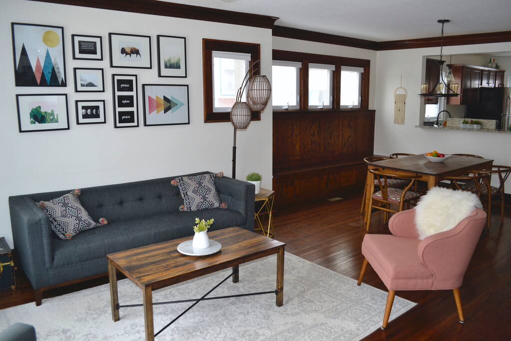 Main floor living room with beautiful view out into the park and lots of light