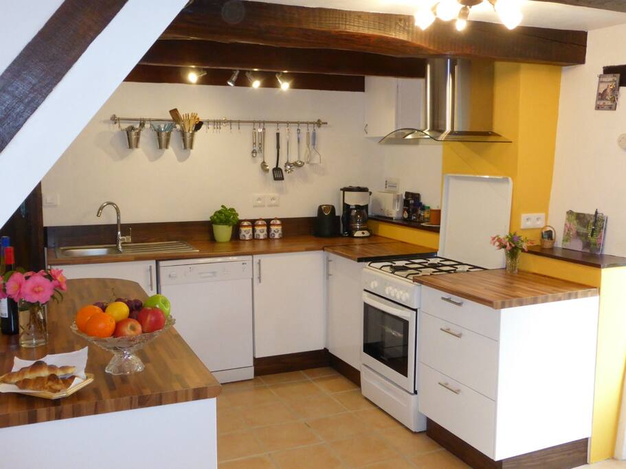 New modern fully equipped kitchen with fridge-freezer, cooker, dishwasher, microwave, toaster, kettle and filter coffee machine.