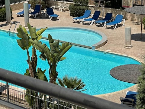 Entire flat with huge balcony and shared pool.
