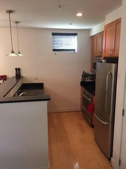 Kitchen has basics: coffee pot, dishes, silver ware, pots and pans.