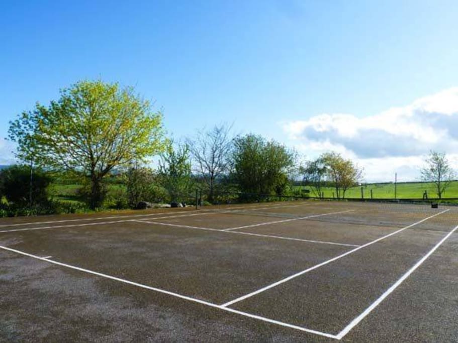 Tennis court and large garden facilities
