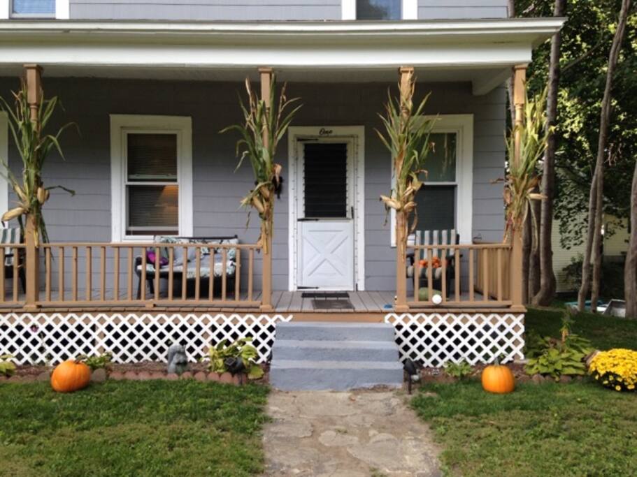 Front of the house with lovely, relaxing porch (fall).