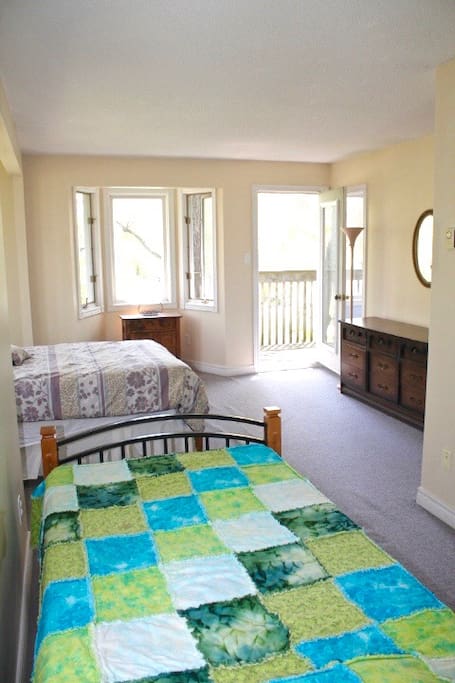 Double bed and single bed room with lake view